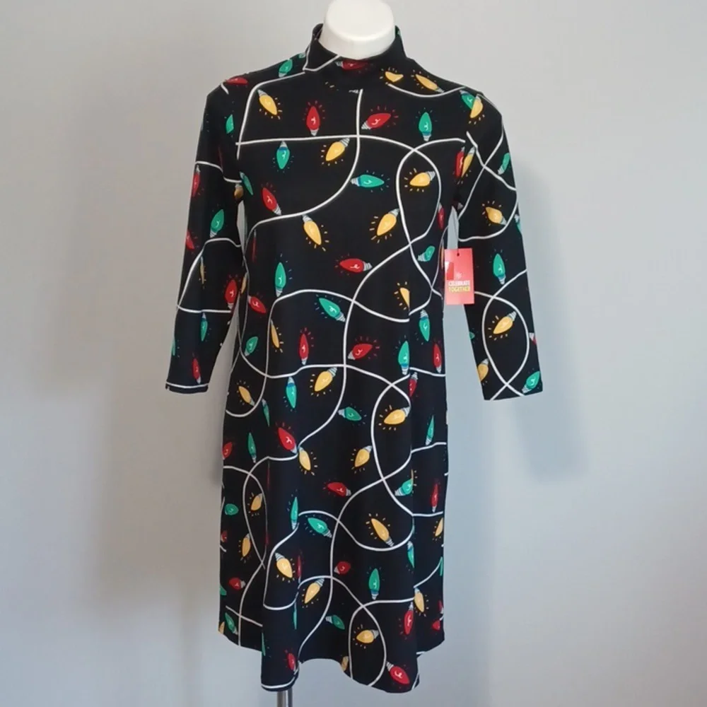 Christmas light pattern black mock neck swing dress w/ 3/4 sleeve. Size XS.  NWT